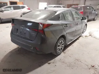 2022 Toyota Prius LE with VIN JTDL9MFUXN3039673, listed as a IAAI auction lot 41509362 with 60,099 mi miles. Bid and sale history available at carsss.com. Image 4.