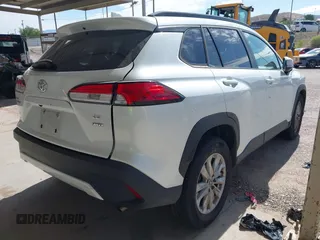 2022 Toyota Corolla Cross LE z VIN 7MUCAABG3NV030906, wystawiony jako IAAI lot #42475640 z przebiegiem 119 135 mil mil oraz . Historia ofert i sprzedaży dostępna na DreamBid. Obrazek 4.