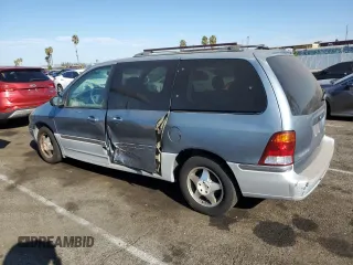 2000 Ford Windstar SEL with VIN 2FMZA5340YBB56738, listed as a Copart auction lot 70502084 with 89,457 mi miles and Salvage Title. Bid and sale history available at carsss.com. Image 2.