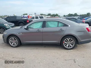 2014 Ford Taurus Limited with VIN 1FAHP2F81EG123902, listed as a IAAI auction lot 42345275 with 152,673 mi miles and . Bid and sale history available at DreamBid. Image 14.