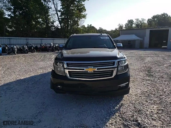 2015 Chevrolet Suburban LTZ with VIN 1GNSCKKC3FR291995, listed as a Copart auction lot 65895214 with 153,672 mi miles and Salvage Title. Bid and sale history available at carsss.com. Image 12.