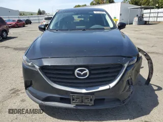 2017 Mazda CX-9 Sport z VIN JM3TCABY6H0131479, wystawiony jako Copart lot #57178805 z przebiegiem 98 698 mil mil oraz Szkoda całkowita • Salvage title. Historia ofert i sprzedaży dostępna na DreamBid. Obrazek 5.