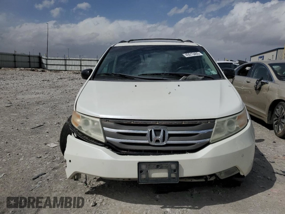 2012 Honda Odyssey Touring z VIN 5FNRL5H93CB070824, wystawiony jako Copart lot #49213465 z przebiegiem 287 745 mil mil oraz Szkoda całkowita • Salvage title. Historia ofert i sprzedaży dostępna na DreamBid. Obrazek 5.