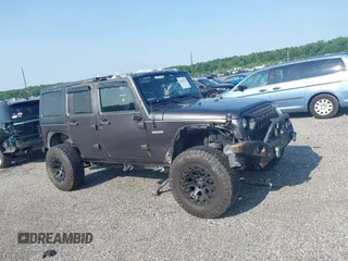 2016 Jeep Wrangler Unlimited Sport with VIN 1C4BJWDG9GL211030, listed as a IAAI auction lot 42459945 with 61,671 mi miles and . Bid and sale history available at DreamBid. Image 13.