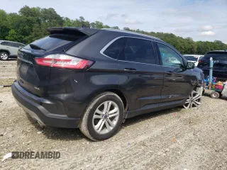2020 Ford Edge SEL с VIN 2FMPK3J97LBB39094, выставлен на аукционе Copart как лот 58571215 с пробегом 95 329 миль миль и Списание • Salvage title. История ставок и продаж доступна на DreamBid. Изображение 3.