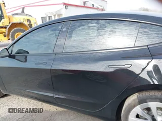2022 Tesla Model 3 Long Range with VIN 5YJ3E1EB6NF343869, listed as a IAAI auction lot 41826077 with 36,643 mi miles and . Bid and sale history available at DreamBid. Image 13.