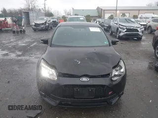 2014 Ford Focus ST with VIN 1FADP3L94EL180667, listed as a IAAI auction lot 41718746 with 141,574 mi miles and . Bid and sale history available at carsss.com. Image 12.
