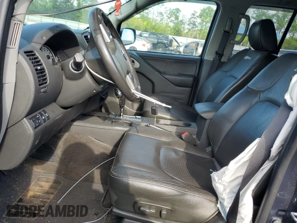 2018 Nissan Frontier Pro-4X with VIN 1N6DD0EV5JN702214, listed as a Copart auction lot 52802715 with 79,837 mi miles and Salvage title. Bid and sale history available at DreamBid. Image 7.