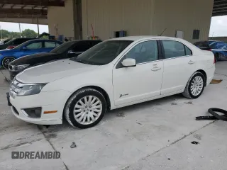2012 Ford Fusion Hybrid z VIN 3FADP0L35CR173817, wystawiony jako Copart lot #62750055 z przebiegiem 145 655 mil mil oraz Czysty tytuł • Clean title. Historia ofert i sprzedaży dostępna na DreamBid. Obrazek 1.