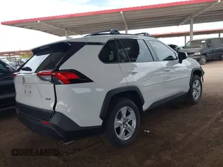 2019 Toyota RAV4 XLE with VIN JTMW1RFV0KD026561, listed as a IAAI auction lot 42035063 with 51,670 mi miles. Bid and sale history available at carsss.com. Image 4.