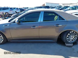 2012 Cadillac CTS Luxury z VIN 1G6DF5E58C0142041, wystawiony jako IAAI lot #42235864 z przebiegiem 59 697 mil mil oraz . Historia ofert i sprzedaży dostępna na DreamBid. Obrazek 14.