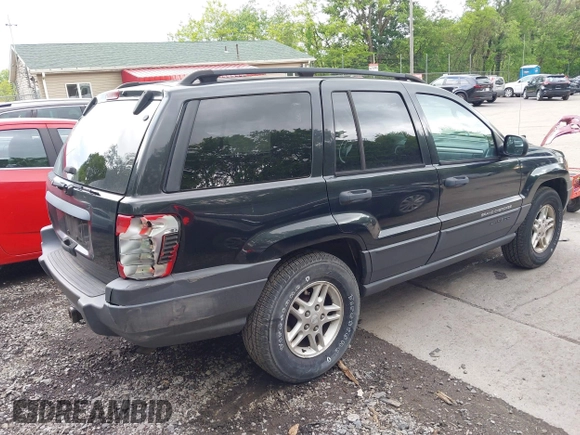 2004 Jeep Grand Cherokee Laredo with VIN 1J8GW48S94C357443, listed as a IAAI auction lot 42309958 with 176,738 mi miles and . Bid and sale history available at DreamBid. Image 4.