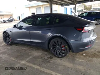 2021 Tesla Model 3 Performance with VIN 5YJ3E1EC1MF074350, listed as a Copart auction lot 47434275 with 63,319 mi miles and Salvage Title. Bid and sale history available at DreamBid. Image 2.