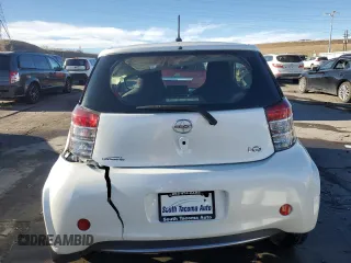 2014 Scion iQ with VIN JTNJJXB01EJ026837, listed as a Copart auction lot 43596385 with 52,826 mi miles and Salvage title. Bid and sale history available at DreamBid. Image 6.