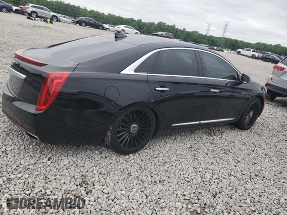 2017 Cadillac XTS Luxury z VIN 2G61M5S34H9199779, wystawiony jako Copart lot #54131845 z przebiegiem 110 571 mil mil oraz Szkoda całkowita • Salvage title. Historia ofert i sprzedaży dostępna na DreamBid. Obrazek 3.