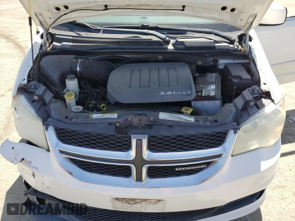 2011 Dodge Grand Caravan Crew with VIN 2D4RN5DG4BR699707, listed as a Copart auction lot 52055425 with 144,904 mi miles and Salvage Title. Bid and sale history available at DreamBid. Image 12.