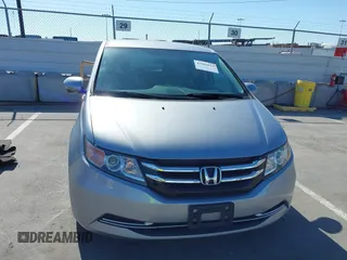 2016 Honda Odyssey SE with VIN 5FNRL5H32GB153002, listed as a IAAI auction lot 42084022 with 63,764 mi miles and . Bid and sale history available at DreamBid. Image 12.