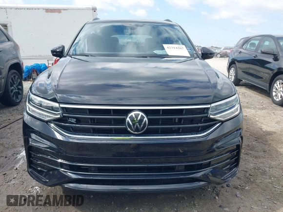 2023 Volkswagen Tiguan SE R-Line Black с VIN 3VVCB7AX3PM131427, выставлен на аукционе IAAI как лот 42314267 с пробегом 19 250 миль миль и . История ставок и продаж доступна на DreamBid. Изображение 12.