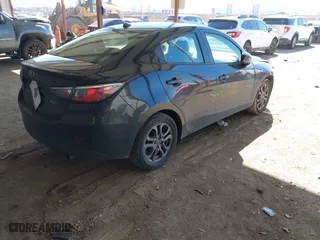 2020 Toyota Yaris Sedan L with VIN 3MYDLBYV4LY716125, listed as a IAAI auction lot 41630523 with 55,282 mi miles. Bid and sale history available at carsss.com. Image 4.