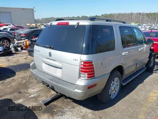 2003 Mercury Mountaineer Convenience z VIN 4M2ZU86K73UJ14054, wystawiony jako IAAI lot #41649332 z przebiegiem 210 772 mil mil oraz . Historia ofert i sprzedaży dostępna na DreamBid. Obrazek 4.