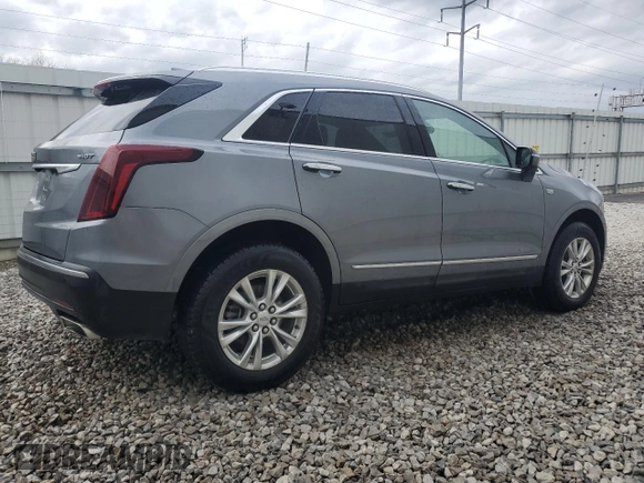2021 Cadillac XT5 AWD Luxury z VIN 1GYKNBR49MZ147215, wystawiony jako Copart lot #50804575 z przebiegiem 82 153 mil mil oraz Czysty tytuł • Clean title. Historia ofert i sprzedaży dostępna na DreamBid. Obrazek 3.