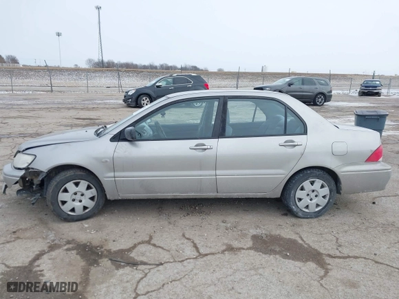 2002 Mitsubishi Lancer ES with VIN JA3AJ26E62U043039, listed as a IAAI auction lot 41600217 with 141,217 mi miles. Bid and sale history available at carsss.com. Image 14.