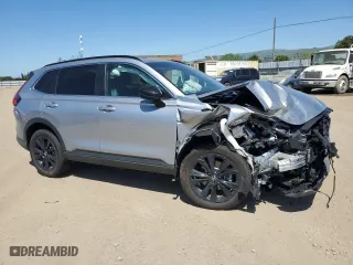2024 Honda CR-V Hybrid Sport Touring with VIN 7FARS6H91RE052103, listed as a Copart auction lot 52047035 with 7,091 mi miles and Salvage Title. Bid and sale history available at carsss.com. Image 4.