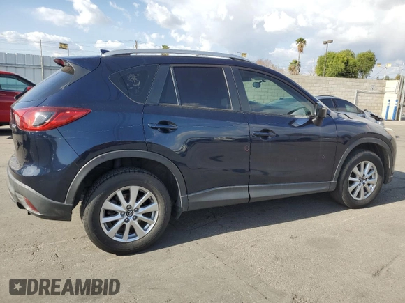 2016 Mazda CX-5 Sport with VIN JM3KE2BY0G0730906, listed as a Copart auction lot 51611865 with 207,166 mi miles and Salvage Title. Bid and sale history available at carsss.com. Image 3.