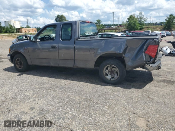 2004 Ford F-150 XL with VIN 2FTRX17W54CA32203, listed as a Copart auction lot 61666385 with Not provided miles and Salvage title. Bid and sale history available at DreamBid. Image 2.