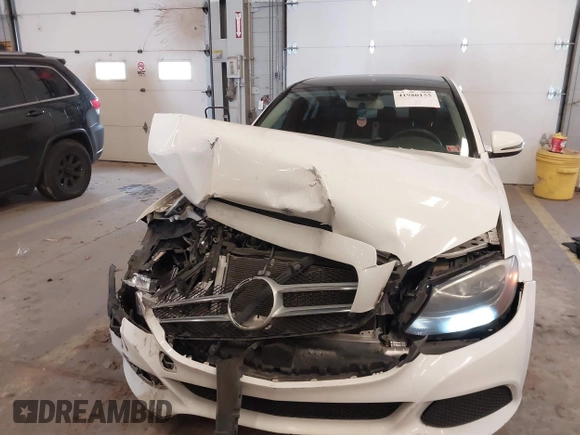 2016 Mercedes-Benz C 300 z VIN 55SWF4JB0GU160647, wystawiony jako IAAI lot #41980155 z przebiegiem 66 783 mil mil oraz . Historia ofert i sprzedaży dostępna na DreamBid. Obrazek 13.