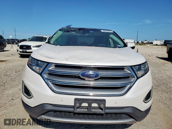 2017 Ford Edge Titanium z VIN 2FMPK4K87HBC26173, wystawiony jako Copart lot #58070565 z przebiegiem 63 989 mil mil oraz Szkoda całkowita • Salvage title. Historia ofert i sprzedaży dostępna na DreamBid. Obrazek 5.