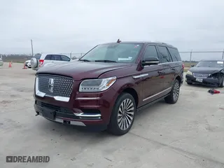 2021 Lincoln Navigator Reserve with VIN 5LMJJ2LT2MEL17430, listed as a IAAI auction lot 41623672 with 21,706 mi miles. Bid and sale history available at carsss.com. Image 2.