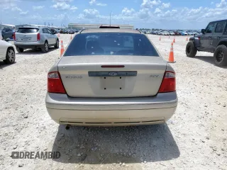 2006 Ford Focus S with VIN 1FAFP34N26W225772, listed as a Copart auction lot 62657045 with 117,078 mi miles and Salvage title. Bid and sale history available at DreamBid. Image 6.