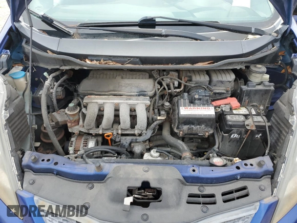 2009 Honda Fit with VIN JHMGE882X9S007865, listed as a Copart auction lot 61025875 with 159,919 mi miles and Clean title. Bid and sale history available at DreamBid. Image 11.
