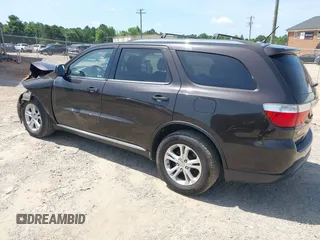 2013 Dodge Durango SXT with VIN 1C4RDJAG7DC580249, listed as a IAAI auction lot 42535723 with 199,626 mi miles and . Bid and sale history available at DreamBid. Image 3.