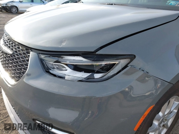 2021 Chrysler Pacifica Touring L with VIN 2C4RC1BG4MR598328, listed as a IAAI auction lot 41749306 with 78,035 mi miles and . Bid and sale history available at DreamBid. Image 6.