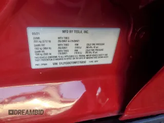 2021 Tesla Model Y Performance z VIN 5YJYGDEF8MF276050, wystawiony jako Copart lot #49314585 z przebiegiem 35 479 mil mil oraz Szkoda całkowita • Salvage title. Historia ofert i sprzedaży dostępna na DreamBid. Obrazek 14.