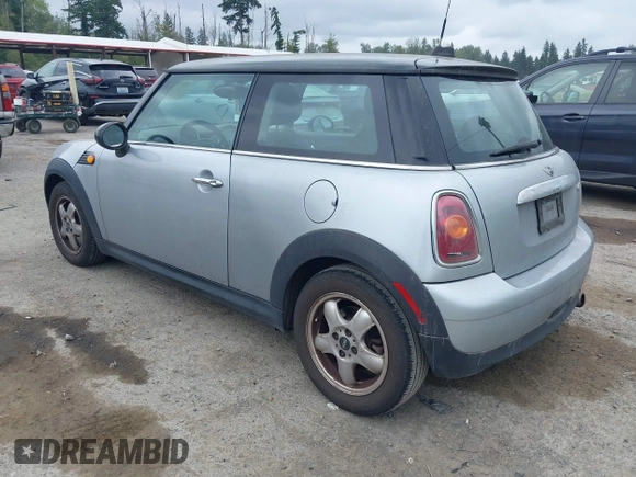 2007 MINI Hardtop with VIN WMWMF33557TU61953, listed as a IAAI auction lot 42678840 with 139,665 mi miles and . Bid and sale history available at DreamBid. Image 3.