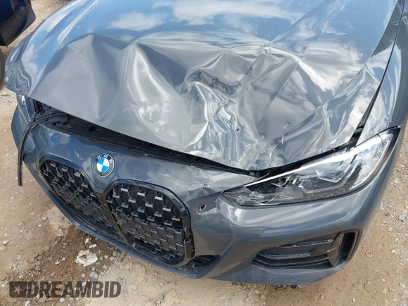 2021 BMW 4 Series M440i with VIN WBA53AT05MCG89665, listed as a IAAI auction lot 42319456 with Not provided miles and . Bid and sale history available at DreamBid. Image 6.