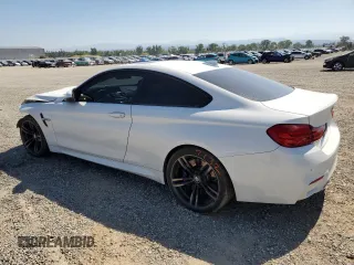 2015 BMW M4 with VIN WBS3R9C5XFK332385, listed as a Copart auction lot 55973963 with 72,879 mi miles. Bid and sale history available at carsss.com. Image 2.