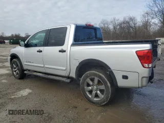 2015 Nissan Titan Pro-4X with VIN 1N6AA0EC1FN512072, listed as a Copart auction lot 85733174 with 92,460 mi miles and Salvage title. Bid and sale history available at DreamBid. Image 2.