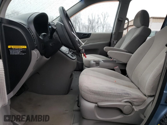 2007 Kia Sedona with VIN KNDMB133976140644, listed as a Copart auction lot 84087384 with 101,497 mi miles and Salvage Title. Bid and sale history available at carsss.com. Image 7.