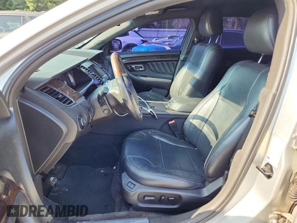 2014 Ford Taurus Limited with VIN 1FAHP2F89EG165301, listed as a Copart auction lot 63856455 with 160,439 mi miles and Clean title. Bid and sale history available at DreamBid. Image 7.