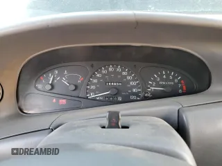 1998 Ford Escort z VIN 3FALP1131WR101490, wystawiony jako Copart lot #74065584 z przebiegiem 144 659 mil mil oraz Szkoda całkowita • Salvage title. Historia ofert i sprzedaży dostępna na DreamBid. Obrazek 9.