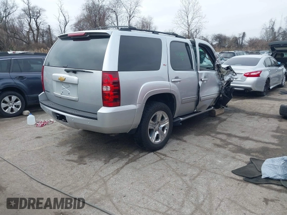 2013 Chevrolet Tahoe LT z VIN 1GNSKBE08DR166024, wystawiony jako IAAI lot #41768851 z przebiegiem 198 302 mil mil oraz . Historia ofert i sprzedaży dostępna na DreamBid. Obrazek 4.