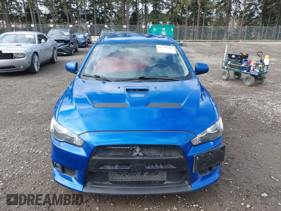 2015 Mitsubishi Lancer Evolution GSR with VIN JA32W8FV4FU012578, listed as a IAAI auction lot 41730742 with 64,762 mi miles. Bid and sale history available at carsss.com. Image 13.