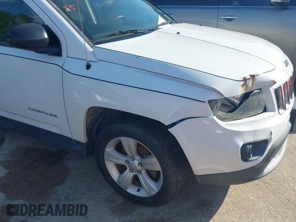 2016 Jeep Compass Sport with VIN 1C4NJCBA7GD705620, listed as a IAAI auction lot 42252671 with 105,903 mi miles and . Bid and sale history available at DreamBid. Image 12.