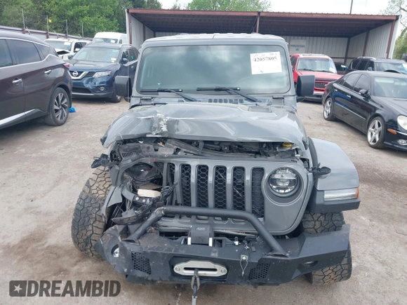 2021 Jeep Gladiator Rubicon with VIN 1C6JJTBG8ML619972, listed as a IAAI auction lot 42057805 with 37,875 mi miles and . Bid and sale history available at DreamBid. Image 13.