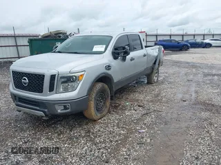 2017 Nissan Titan Pro-4X z VIN 1N6BA1F45HN529090, wystawiony jako IAAI lot #42163486 z przebiegiem 162 226 mil mil oraz . Historia ofert i sprzedaży dostępna na DreamBid. Obrazek 18.