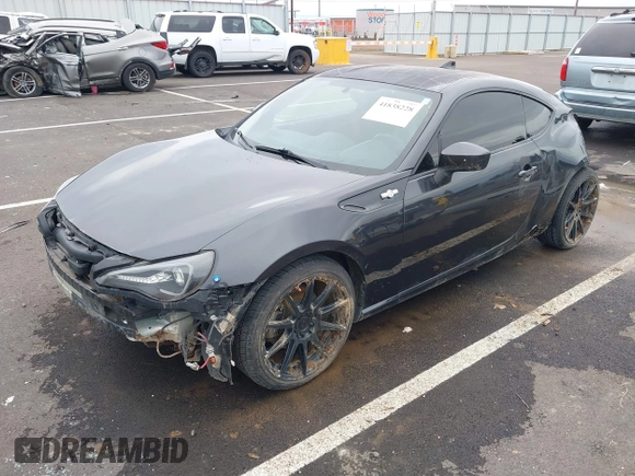 2015 Scion FR-S z VIN JF1ZNAA16F9710455, wystawiony jako IAAI lot #41838228 z przebiegiem 103 097 mil mil oraz . Historia ofert i sprzedaży dostępna na DreamBid. Obrazek 21.